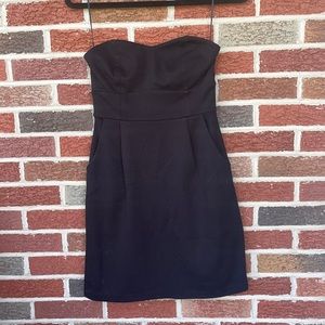 Black strapless dress with silver zipper in the back. Size is a 2.